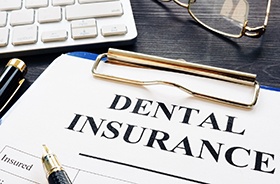 dental insurance paperwork for the cost of dental implants in Buzzards Bay