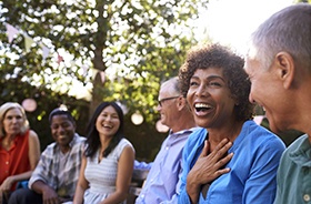 Diverse group of friends with dental implants in Buzzards Bay